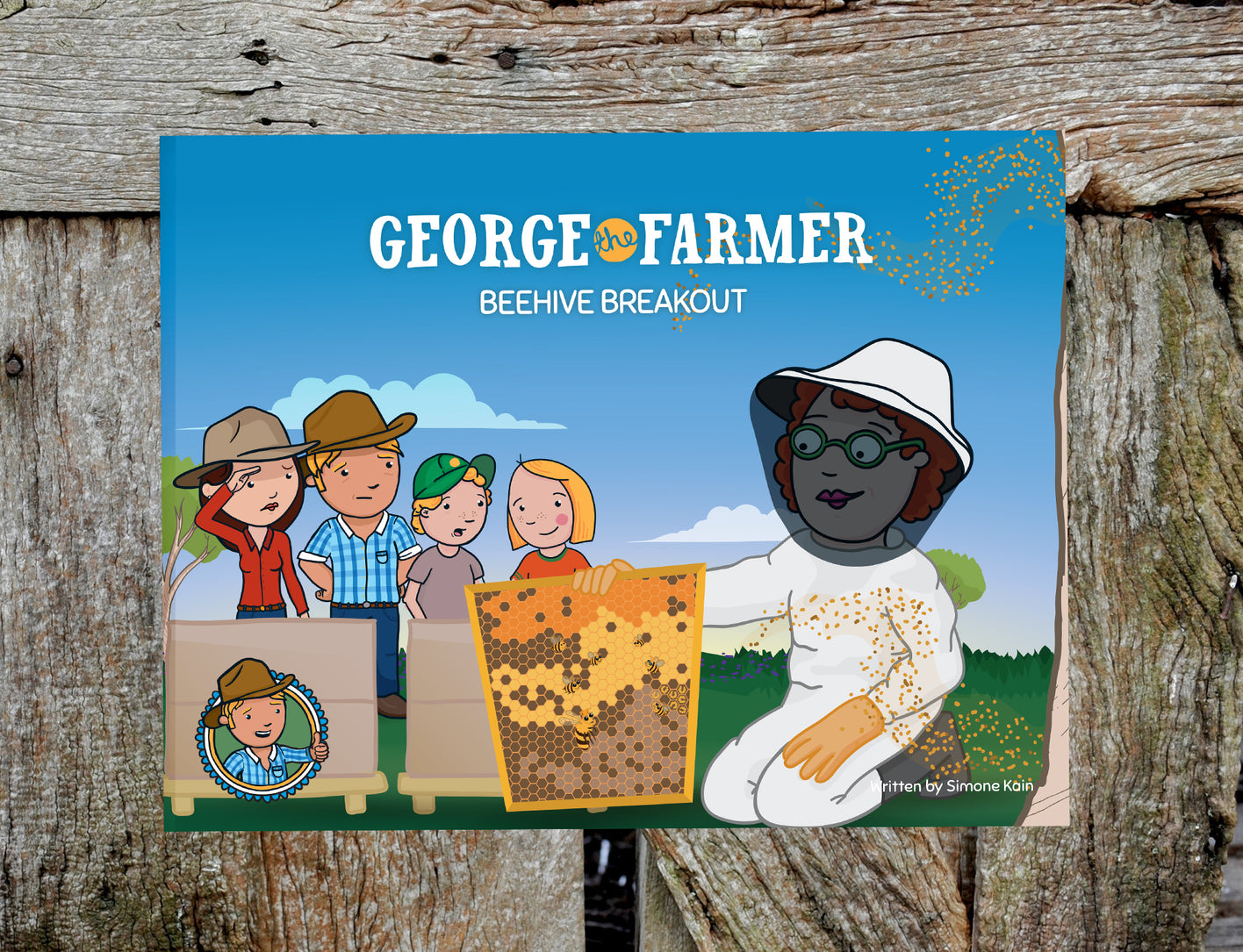 Cover of the picture book 'George the Farmer Beehive Breakout' featuring illustrated characters including a family and a beekeeper.